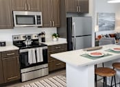 Thumbnail 2 of 46 - Kitchen and counters at Artesia at Lakewood Ranch Apartments, Bradenton