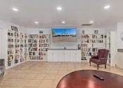 Thumbnail 13 of 26 - a room filled with lots of books