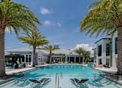 Thumbnail 9 of 36 - the swimming pool at the resort at longboat key club at The Addison on Long Bayou Apartments, Seminole, 33772