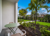 Thumbnail 18 of 35 - Patio at The Lotus at Village Walk, Fort Myers, FL