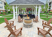 Thumbnail 12 of 20 - Fire pit by a gazebo