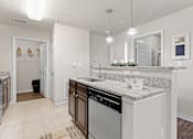 Thumbnail 4 of 40 - a kitchen with a sink and a dishwasher