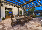 Thumbnail 24 of 35 - Outdoor Shaded Lounge at The Lotus at Village Walk, Fort Myers, FL, 33966