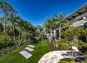 Thumbnail 25 of 35 - Courtyard Garden Space at The Lotus at Village Walk, Fort Myers, 33966
