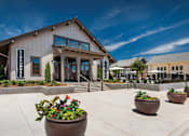 Thumbnail 34 of 40 - leasing office and clubhouse exterior view at The Cottages at Old Monrovia Apartment , Huntsville, AL