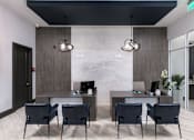 Thumbnail 41 of 51 - a lobby with two tables and chairs and a reception desk at Enclave at 3230 Apartments, South Daytona, 32119