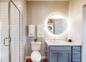 Thumbnail 28 of 54 - A white toilet sits in a bathroom next to a sink. at The Arlow on Kellog, Minnesota, 55102