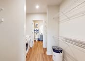 Thumbnail 20 of 54 - A laundry room with a washer and dryer. at The Arlow on Kellog, St. Paul, 55102
