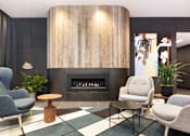 Thumbnail 9 of 19 - A modern living room with a fireplace and comfortable seating.