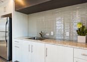 Thumbnail 27 of 35 - Clubhouse Kitchen area at Park 88 Apartments, Thornton, CO, 80229