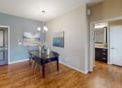 Thumbnail 22 of 49 - a dining room with a table and chairs at Skye at Arbor Lakes, Maple Grove, MN
