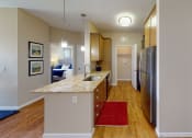 Thumbnail 17 of 49 - a kitchen with stainless steel appliances and a granite counter top at Skye at Arbor Lakes, Maple Grove, Minnesota