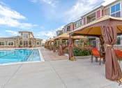 Thumbnail 34 of 44 - Swimming Pool with Cabanas at Solaire Apartments in Brighton, CO