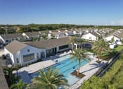 Thumbnail 36 of 40 - Aerial view of the pool and clubhouse at Odyssey at Soltura at Odyssey, Florida, 33905