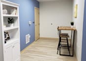 Thumbnail 38 of 50 - Table space and bookcase in new business center