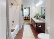 Thumbnail 13 of 39 - a bathroom with a tub and a sink at The Bend Arbordale, Virginia, 23188