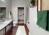 Thumbnail 14 of 39 - a bathroom with a toilet sink and bathtub at The Bend Arbordale, Virginia, 23188