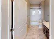 Thumbnail 21 of 33 - a bathroom with a toilet and a sink at The Landing Apartment , Hazlet