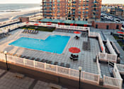 Thumbnail 28 of 43 - Aerial view of Pool at 10 West Apartments, Long Beach, NY, 11561