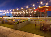 Thumbnail 34 of 43 - Night lights of outdoor at 10 West Apartments, Long Beach, New York