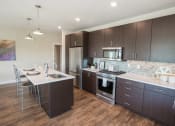 Thumbnail 26 of 35 - Gourmet Kitchen at Union West Apartments in Lakewood, CO