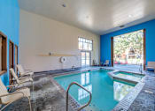 Thumbnail 9 of 23 - Indoor pool and spa at The Village at Seeley Lake