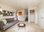 Thumbnail 2 of 13 - Living Room at Village Gardens Apartments in Fort Collins, CO