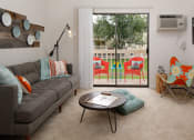 Thumbnail 3 of 13 - Living Room at Village Gardens Apartments in Fort Collins, CO