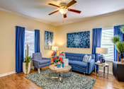 Thumbnail 5 of 12 - Living Room With Ceiling Fan at Pavilions at Northshore Apartment Homes, Portland, TX