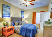 Thumbnail 9 of 12 - Bedroom With Ceiling Fan at Pavilions at Northshore Apartment Homes, Portland