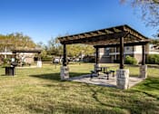 Thumbnail 12 of 12 - Outdoor Grilling Area at Pavilions at Northshore Apartment Homes, Portland, TX