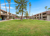 Thumbnail 4 of 27 - Verde Apartments buildings with grass in front. Tucson, AZ, 85719