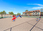 Thumbnail 24 of 27 - Outside Dog Park with play equipment at Verde Apartments, Tucson, AZ