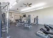 Thumbnail 22 of 25 - Fitness Center with Cardio Equipment and Weight Training Equipment  at Legacy Brooks, San Antonio