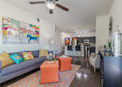 Thumbnail 15 of 25 - Living Room with Kitchen View and Furniture  at Legacy Brooks, San Antonio, 78223