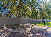 Thumbnail 15 of 15 - a backyard with a tree and a fence