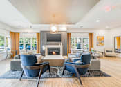 Thumbnail 49 of 87 - Clubhouse With TV And Fireplace at Axis at Lakeshore, Bridgewater, MA