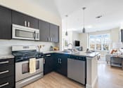 Thumbnail 51 of 87 - Kitchen Appliances at Axis at Lakeshore, Bridgewater, Massachusetts