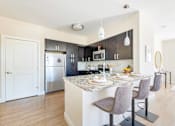 Thumbnail 60 of 87 - Island Kitchen at Axis at Lakeshore, Massachusetts