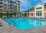 Thumbnail 32 of 35 - A large swimming pool at Axis at Lakeshore Apartments, MA,02324