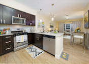 Thumbnail 14 of 35 - Modern Kitchen at Axis at Lakeshore Apartments, Massachusetts, 02324