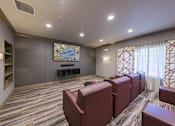 Thumbnail 30 of 35 - A room with a carpeted floor at Axis at Lakeshore Apartments, Bridgewater, MA 02324