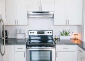Thumbnail 9 of 16 - Stove/ Microwave