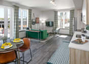 Thumbnail 8 of 23 - Staged interior with view of dining and living