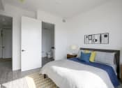 Thumbnail 9 of 19 - Staged Bedroom with Bathroom