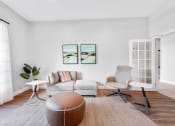 Thumbnail 16 of 49 - a living room with a couch and two chairs