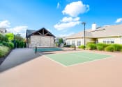 Thumbnail 31 of 49 - tennis court at the whispering winds apartments in pearland, tx