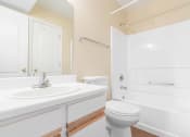 Thumbnail 24 of 24 - a bathroom with a sink toilet and bathtub