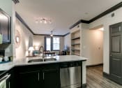 Thumbnail 45 of 54 - the view of a kitchen and living room from the counter top of a counter top