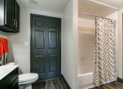 Thumbnail 40 of 54 - the residence on lamar apartment bathroom with shower and toilet